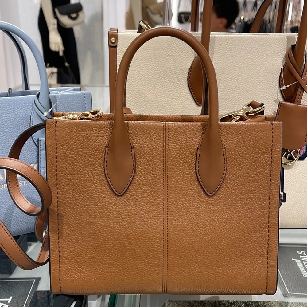 MICHAEL KORS Mirella Sm Shopper TZ XBody Pebbled Leather Crossbody
Luggage
NWT - Picture 5 of 16